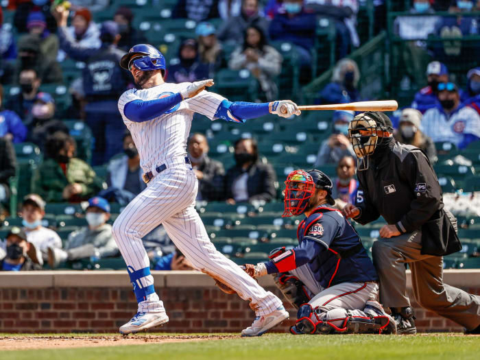 Apr 17, 2021; Chicago, Illinois, USA; Chicago Cubs third baseman Kris Bryant (17) hits a two-run home run against the Atlanta Braves during the fifth inning at Wrigley Field.